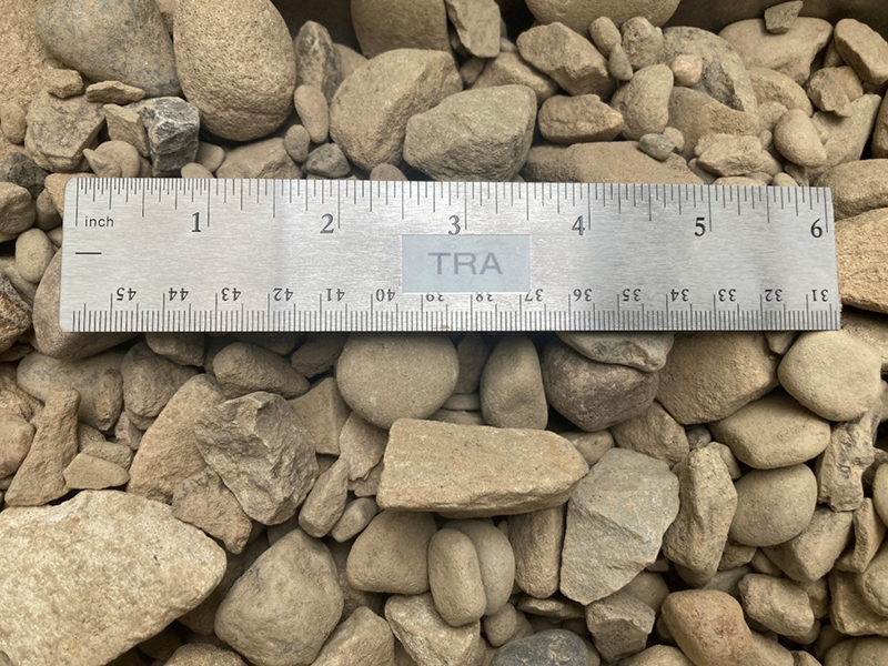 number 57 gravel next to a ruler to show size