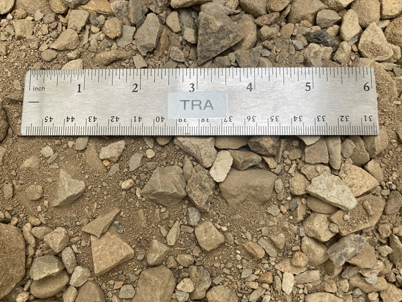 pendot 2rc gravel at our supply yard next to a ruler to show size