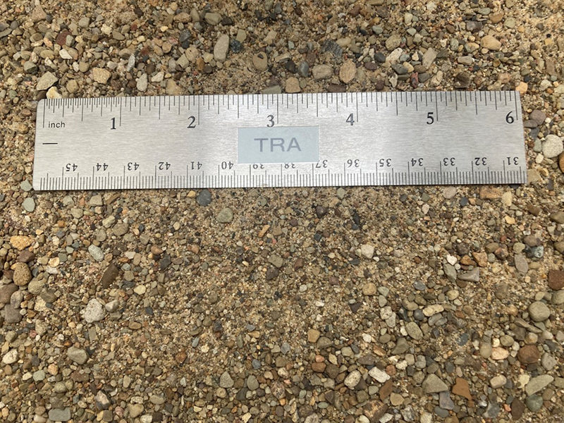 Penndot Type A DEP Septic Concrete Sand at our supply yard next to a ruler to show size